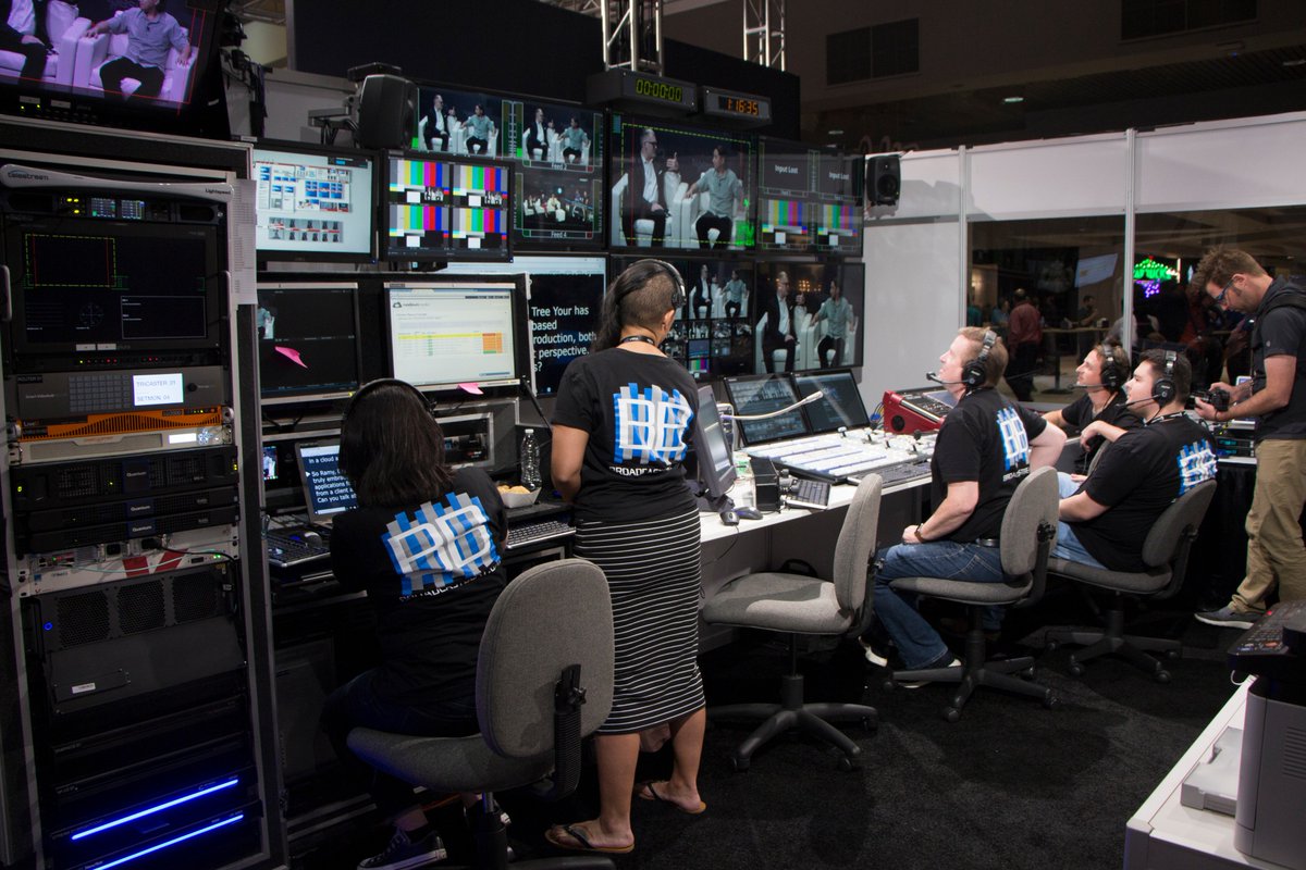 Convention video production crew during live broadcast